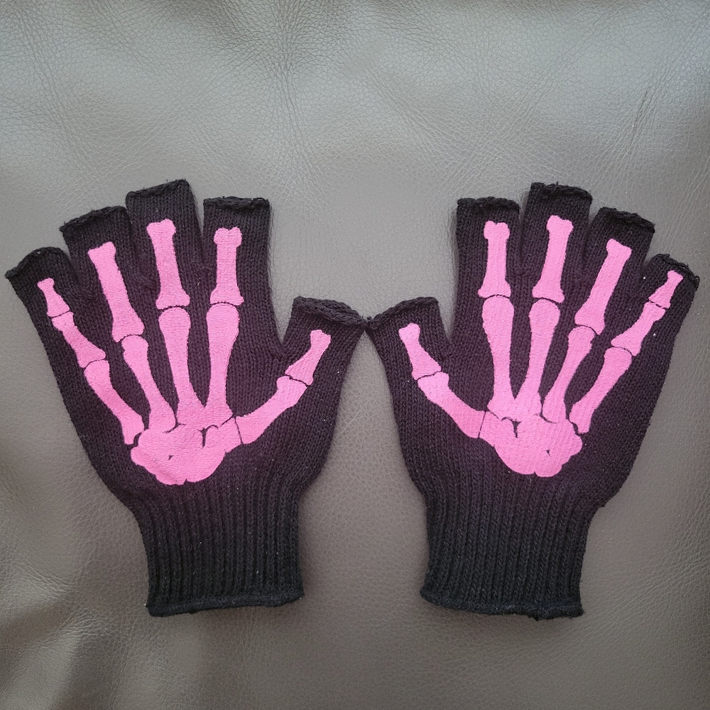Black fingerless gloves with pink skeleton